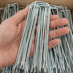 Stakes for holding down landscaping fabric